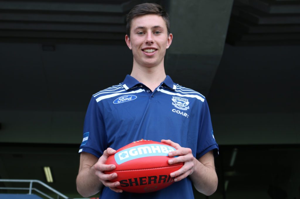 Jack Henry poses for his first photo as a Geelong footballer. Picture: AL PACKER